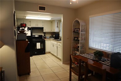 Kitchen and eat in area.  Dining room.