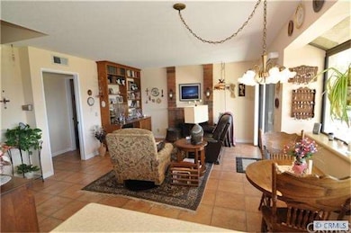 Nice family room with built-in wall unit and pergo