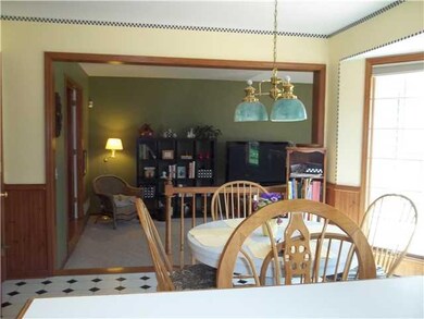 Kitchen. Eating area in kitchen looking toward fam