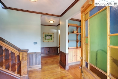 Enter thru the stained glass front door into the foyer area.