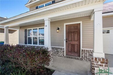 Be greeted by a grassy front yard and mature lands