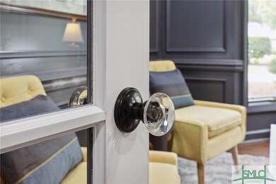 Glass doorknobs and matte black hardware on all do