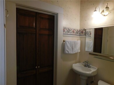 This half bath is just off the kitchen.
