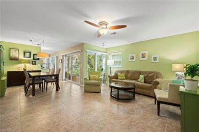 Living room and dining area. With light tile patte