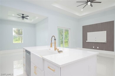 Kitchen featuring stainless steel dishwasher, ceil