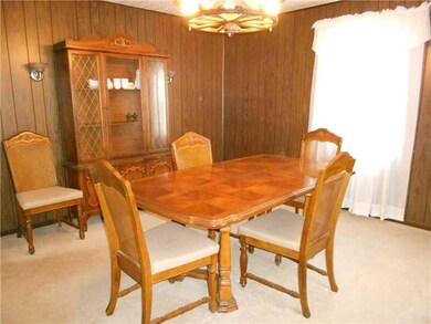 Dining Room. Large dining room with neutral carpet