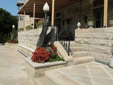 Exterior Back. Steps to the terrace
