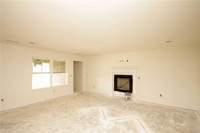Gas fireplace and lots of natural light
