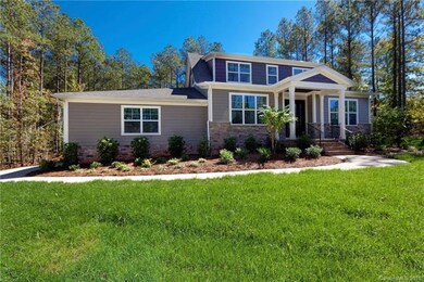 This home is located on a beautiful densely wooded