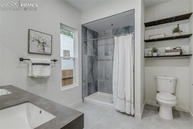 Spa like primary bath with rain shower and hand he