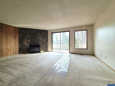 Rock Wall Fireplace, Slider to Deck, View!