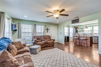Living room is open to the kitchen