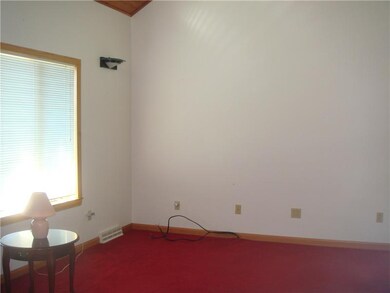 Living Room. Lots of Natural Light is throughout t