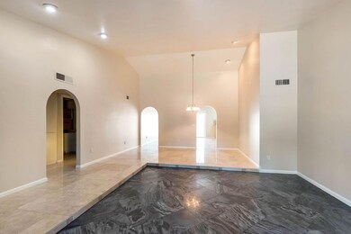 Formal living overlooking dining
