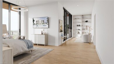 Bedroom featuring light hardwood / wood-style floo