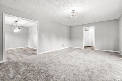 Living room and you can see into dining room