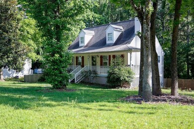 Cape cod home with a porch