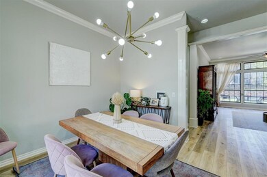 Dining space with light wood-type flooring, ceilin