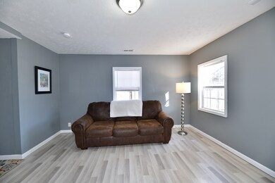 Cozy Living Room with luxury vinyl plank flooring.