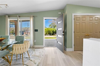 Foyer entrance featuring baseboards, a healthy amo