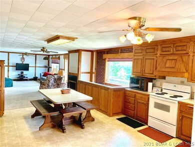 Huge kitchen with custom cabinets throughout