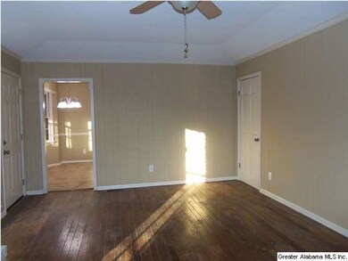 Family room faces the back of the home and has eas