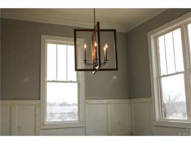 Dining Room with gorgeous fixture!