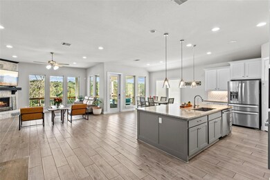 Kitchen featuring appliances with stainless steel