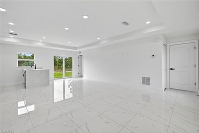 1108 Eauclaire St E, Lehigh Acres, FL 33974 - photo 3