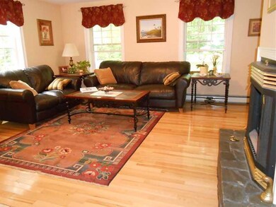 Living Room. Gleaming hardwood...