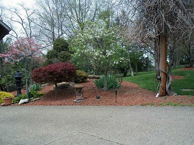 Exterior Front. Beautiful landscaping!