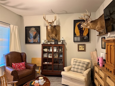 Living area featuring wood finished floors