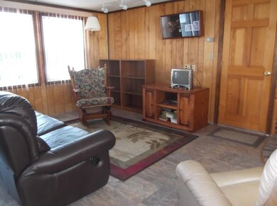 Family room with entrance to tow car...