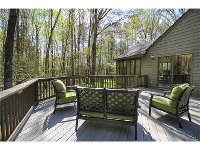 Deck off side of house