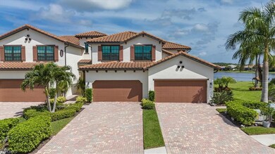 Mediterranean / spanish home featuring a garage