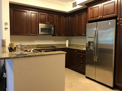 Kitchen w/Cherry Wood Cabinets
