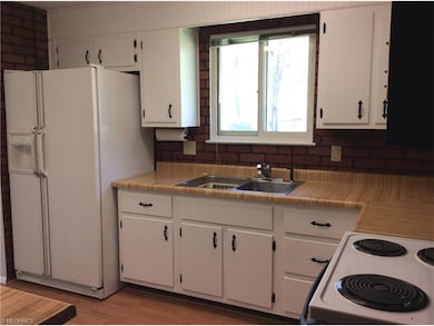 BEADBOARD ON SOFFIT & FRESHLY PAINTED CABINETS & L