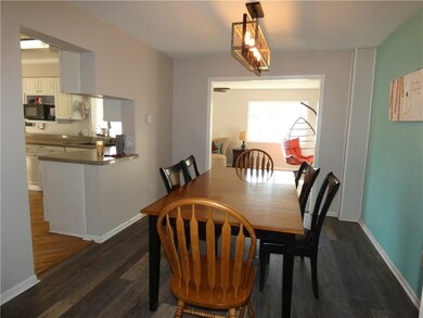Formal Dining opening to Kitchen & Family Room