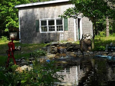 Beautiful pond with working waterfall