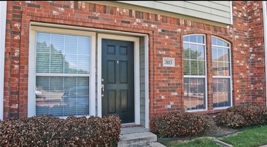 Property entrance with brick siding