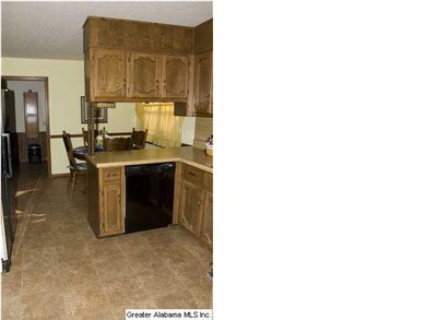 kitchen with lots of cabinets and eat in area