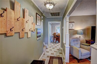 Nice neutral tile flooring welcomes you