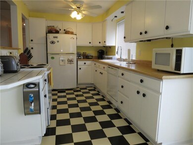 This kitchen has so much storage space!  What a ch