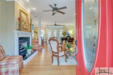 View from front doorway into living room w/ gas fi