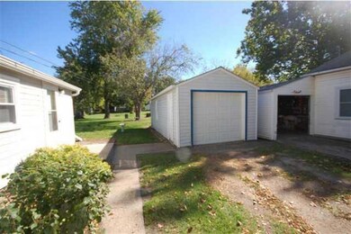 Exterior Front. One Car Detached Garage