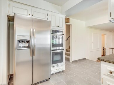 The Eat-In Kitchen is located down the hall way. I