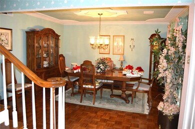 15.4 x 13.8 Formal Dining room with Parquet Flooring! (notice the detailed architectural designs in ceiling)