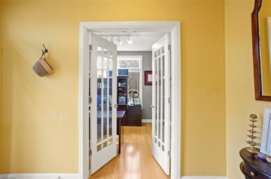 Bifold glass doors open to office/study located of
