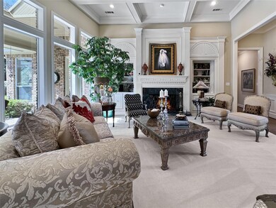 Elegant formal living room features a stunning fir