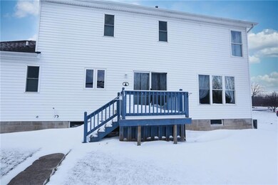 Sliding door in kitchen leads to deck.